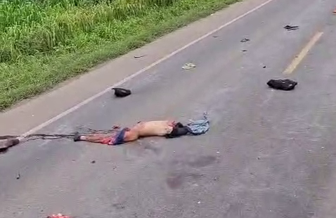 The Body Of A Biker Who Crashed Into A Truck In The Oncoming Lane Is Torn Apart And Decapitated