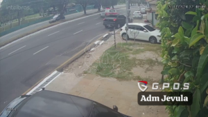 An Out-Of-Control Car Hits A Motorcyclist And Crashes Into A Parked Car 1 An Out-Of-Control Car Hits A Motorcyclist And Crashes Into A Parked Car