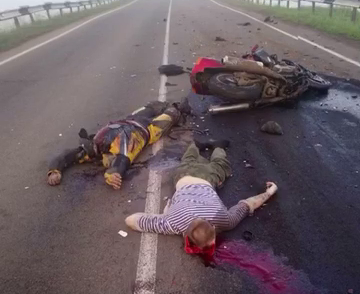 A Motorcyclist Is Decapitated In A Head-on Collision With A Car At High Speed. Russia