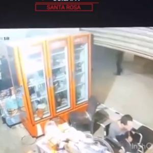 A Camera Captured The Moment A Man Shot A Local Merchant In Front Of His Family 1 A Camera Captured The Moment A Man Shot A Local Merchant In Front Of His Family