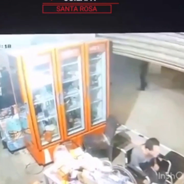 A Camera Captured The Moment A Man Shot A Local Merchant In Front Of His Family