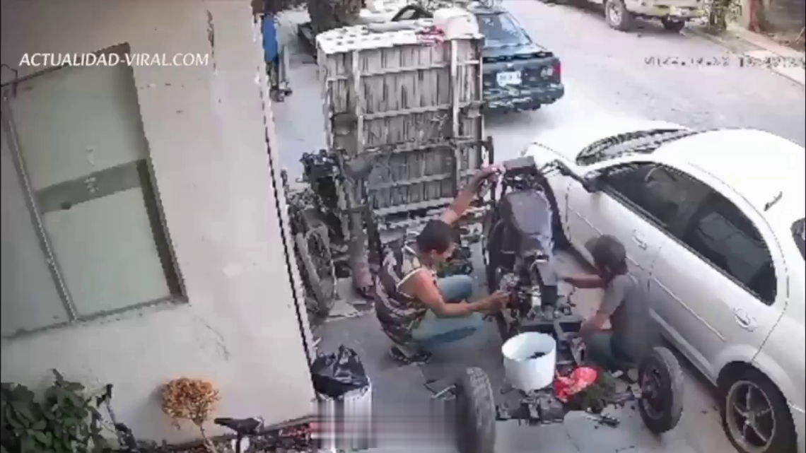 A Woman With A Gun Tries To Shoot One Of The Auto Mechanics