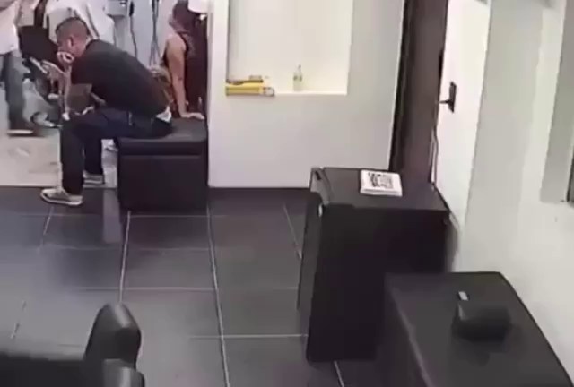 As A Result Of A Bullet Wound In The Stomach, A Man Vomits Blood