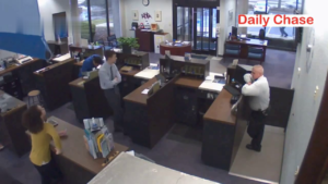 Bank Guard Shot Robber