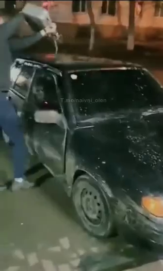 Moron Set Fire To Incorrectly, In His Opinion, A Parked Car. Russia