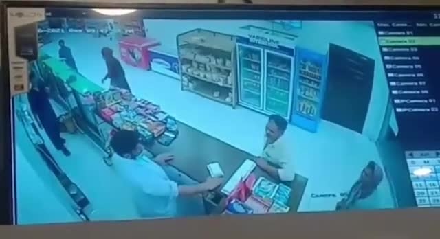 Store owner pulls out ak47 end the drama