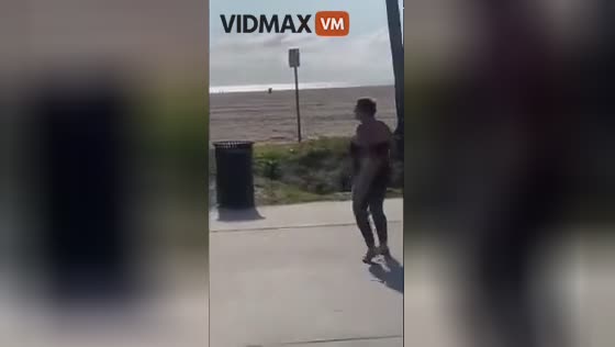 Venice beach in a nutshell as a naked female battles another