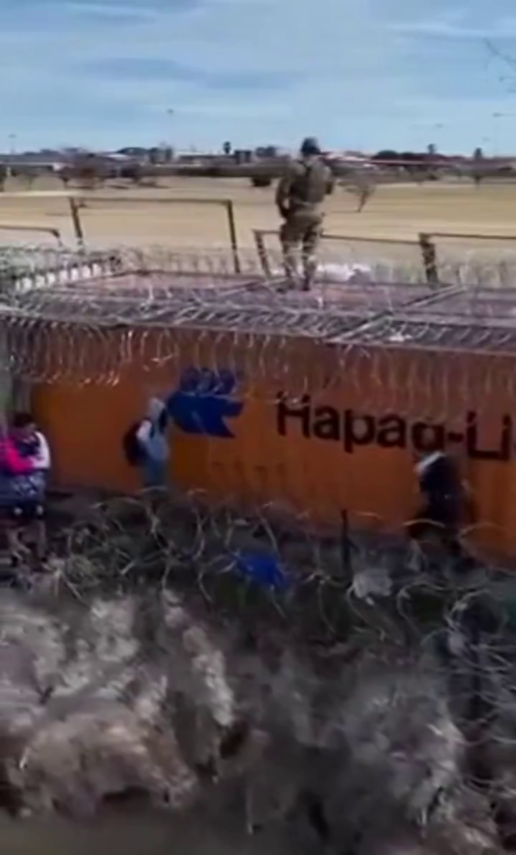 Migrants Search For Gaps In The Wall On The US Border