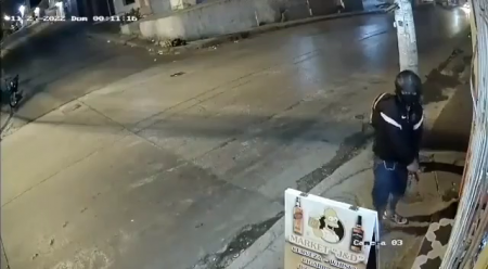 An Assassin Shot A Man Sitting In A Bar In The Back